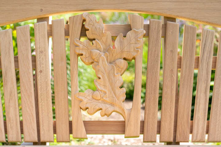 Oak leaf carving in garden bench