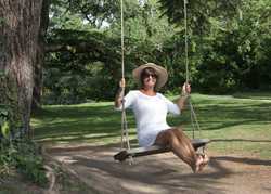 Wooden swing seats for adults: why let the kids have all the fun?