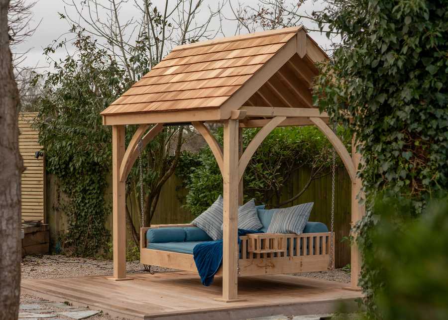 The Swinging Day Bed with Cedar Roof