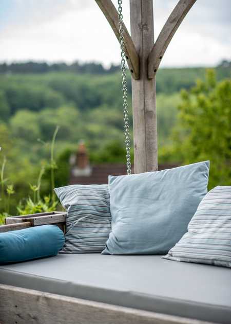 Swinging Day Bed with Cushions