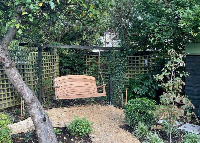 Goalpost Pergola with swing seat in garden - Designed by Clarissa Judd Goalpost Pergola with swing seat in garden - Designed by Clarissa Judd