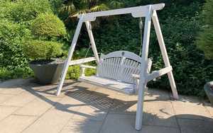 Sitting Spiritually Wooden Benches on display at RHS Harlow Carr