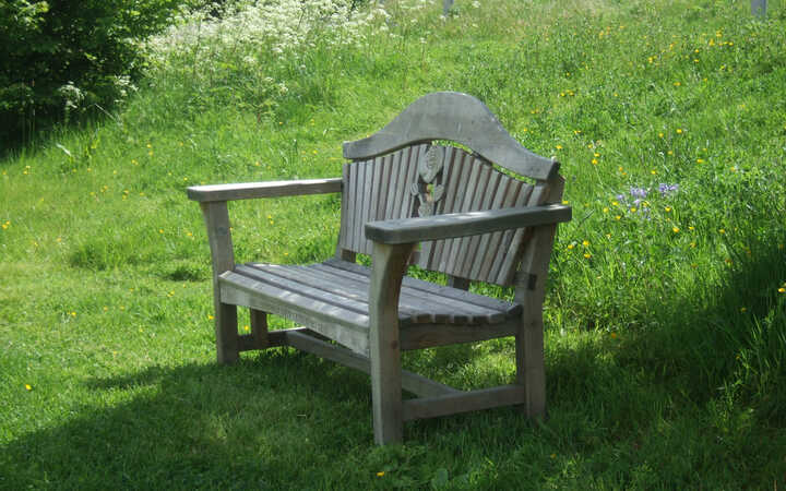 Sitting Spiritually Centenary Bench with unique carvings