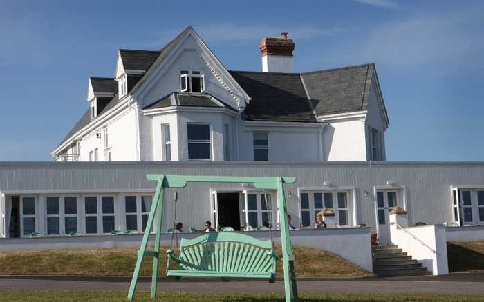 Our Swing Seat in Painted Pine at The Seaside Boarding House