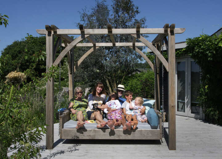 family-on-swinging-day-bed.jpg