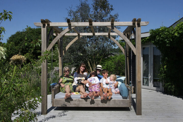 family-on-swinging-day-bed.jpg