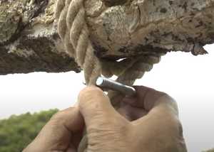 Close up of tightening a rope swing