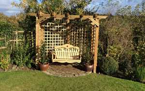 Swing Seat in the Garden with Curved Oak 