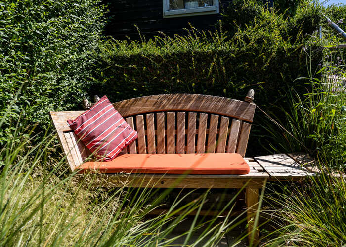 The Knole Garden Bench with cushions