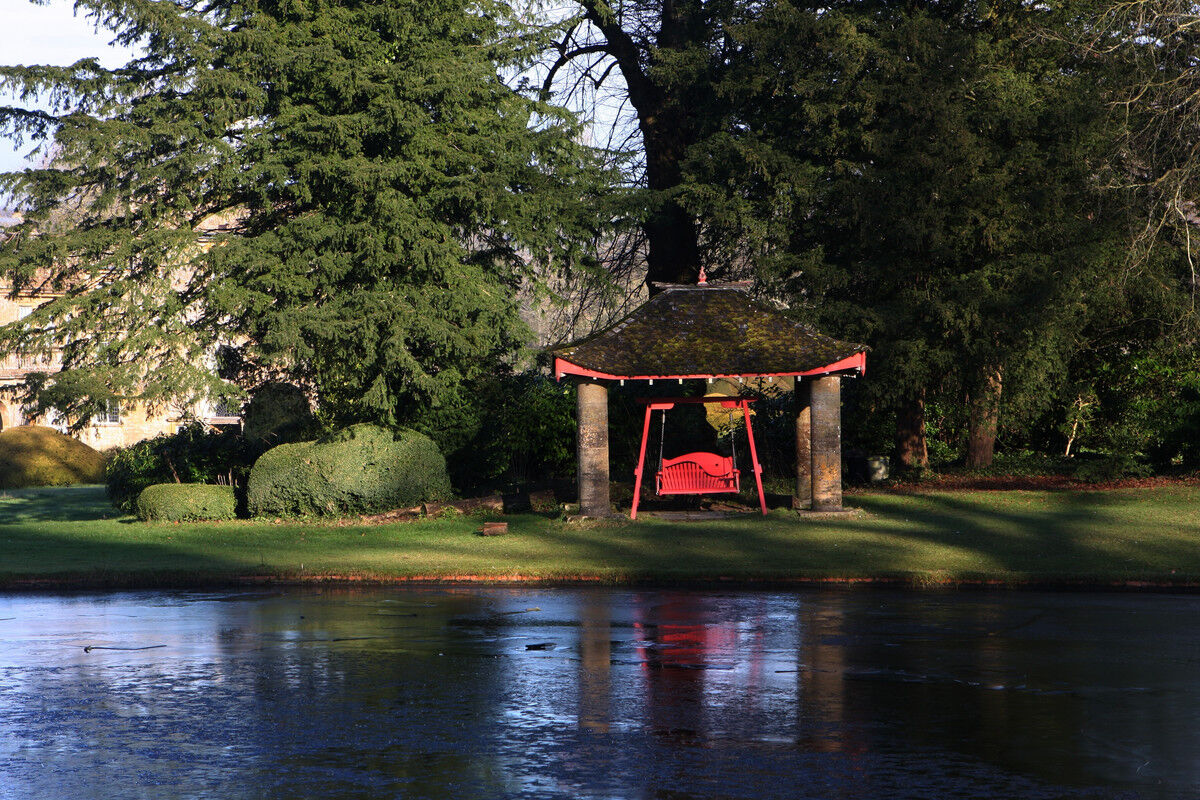Harmony Swing Seat in Painted Pine at Forde Abbey, Dorset