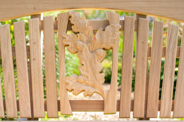 Oak leaf carving in garden bench