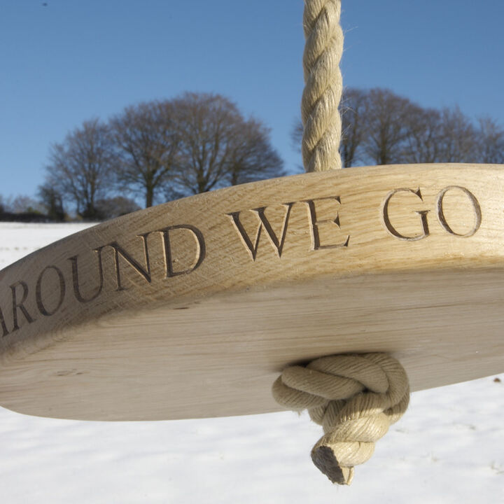 Sitting Spiritually Carved round oak swing