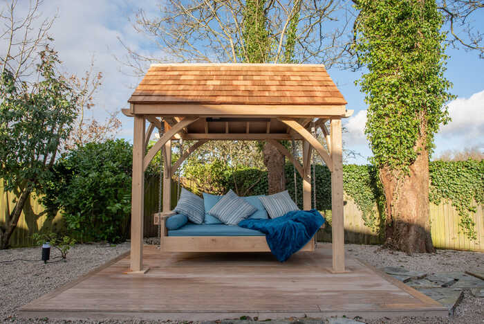 Swinging Day Bed in Oak with Cedar Roof