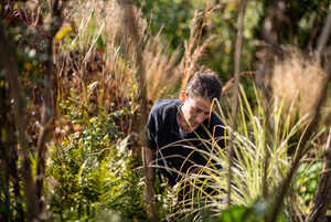 A gardener in the Sitting Spiritually Show Garden