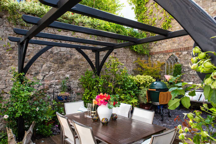 black bespoke pergola