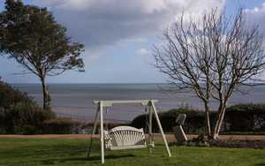 Garden Swing Seat overlooking the sea