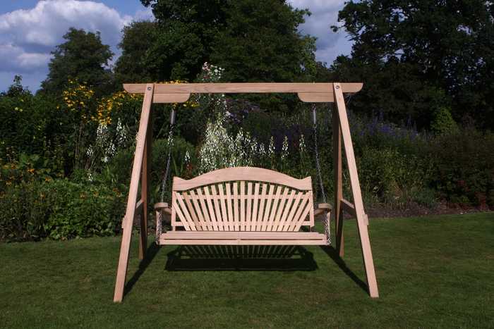 Cedar 2 seater swing seat on a green lawn