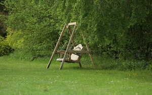 Swing Seat at Forde Abbey with Sun Setting in background