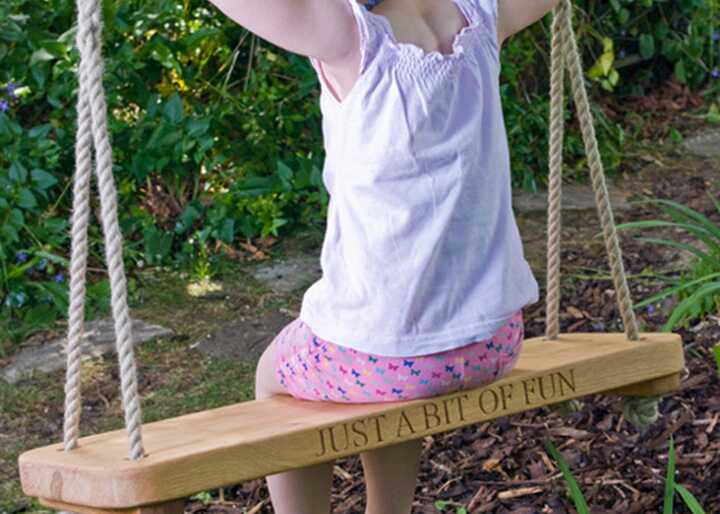 Sitting Spiritually  Carved Rope Swing.jpg