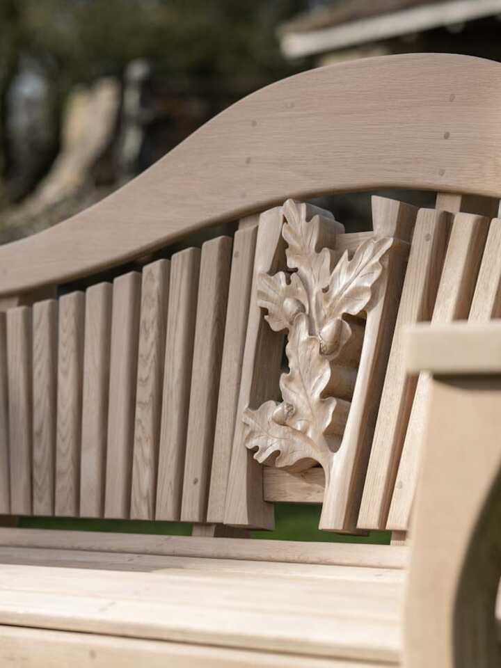 Sitting Spiritually RHS Four Seasons Bench Autumn carving close up.jpg