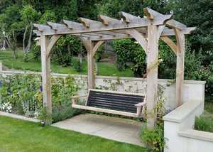 Modern Garden Swing Seat Being Hung from Pergola