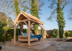 Swinging Day Bed with Cedar Roof