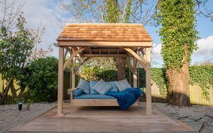 Swinging Day Bed with Cedar Roof