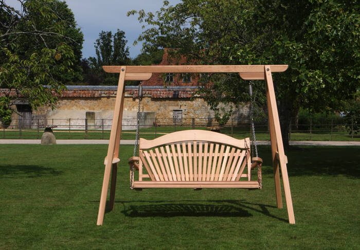 Wooden Garden Swing Seat on a Lawn