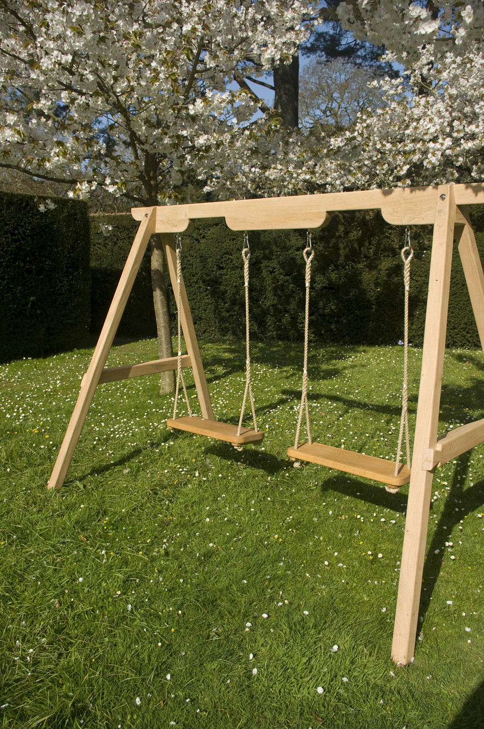 Wooden Garden Swings For Children and Adults Sitting Spiritually